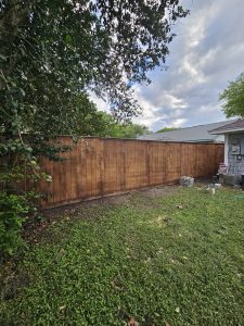 Double-sided privacy cedar fence installation for Eric Ceron in Atascocita, Texas by Mustang Fencing and Gates.