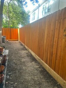 A photo showing Fran Apsteins' Cedar Fence Project in Crosby, Texas, showcasing expert craftsmanship and high-quality materials.