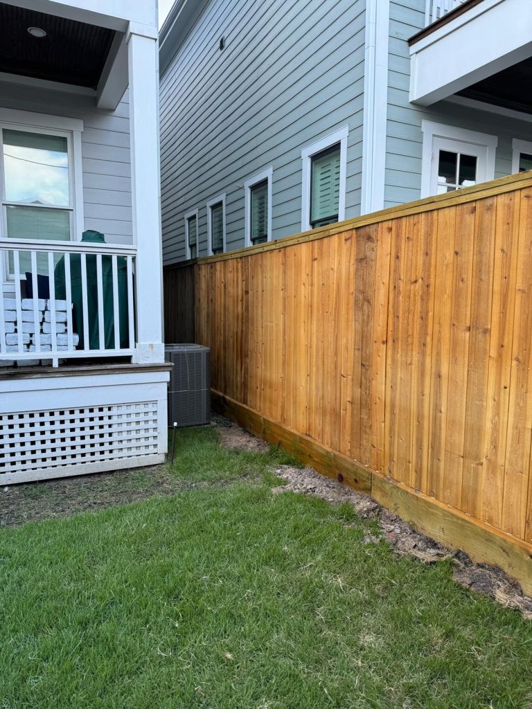 A custom 31-foot cedar fence installed by Mustang Fencing and Gates for Nathaniel Cameron.