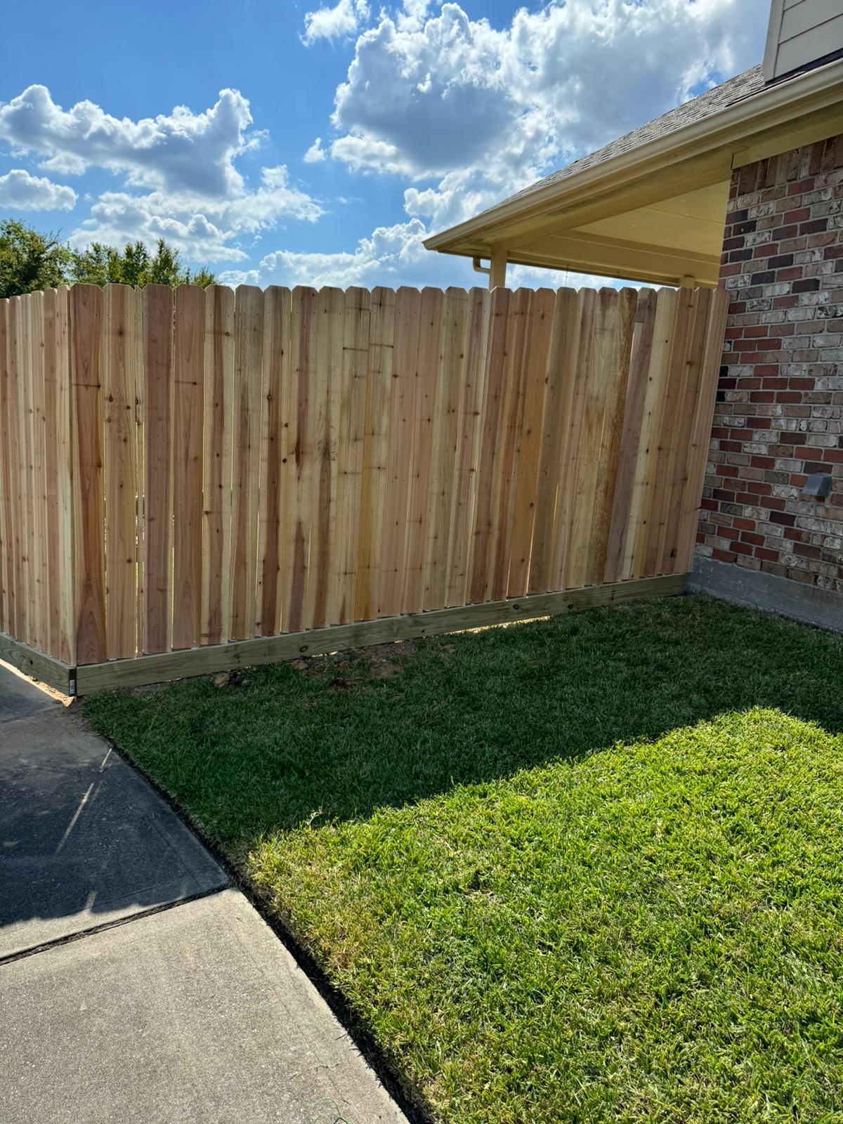 Before and after of a Mustang Fencing and Gates privacy fence transformation in Spring, Texas
