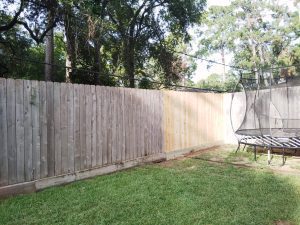 Custom cedar fence and reinforcement installed by Mustang Fencing and Gates for Karla Woodroof's home in Atascocita, TX.