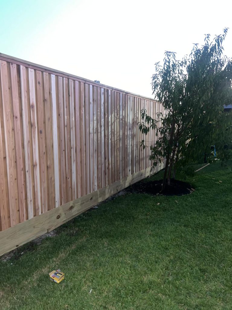 Transforming Privacy and Security A Custom Fence Project in Greenway. - Mustang Fencing and Gates A custom fence project in Greenway, showcasing a transformation of privacy and security by Mustang Fencing and Gates.