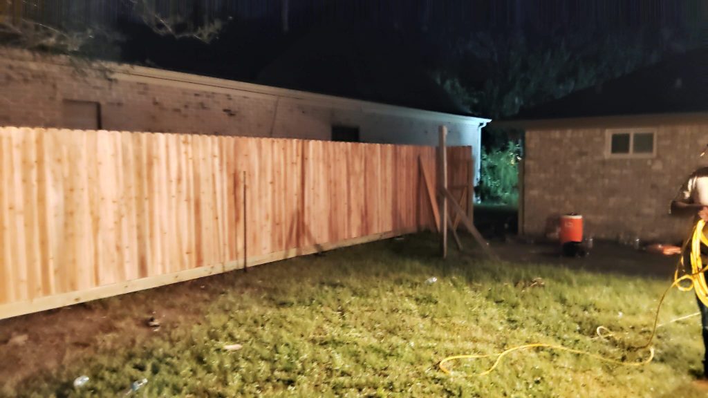 Crafting a 67-Foot Cedar Fence with Gate for Steve Den Bleyker in Houston, Texas. - Mustang Fencing and Gates A 67-foot cedar fence with gate crafted for Steve Den Bleyker in Houston, Texas by Mustang Fencing and Gates.