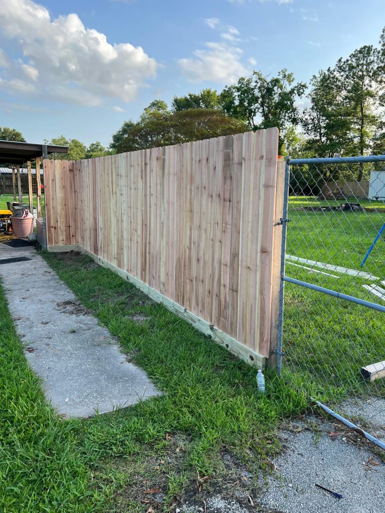 Creating a Stunning Cedar Fence and Gate for Wilda Garret in Porter, Texas - Mustang Fencing and Gates A stunning cedar fence and gate installation for Wilda Garret in Porter, Texas by Mustang Fencing and Gates.