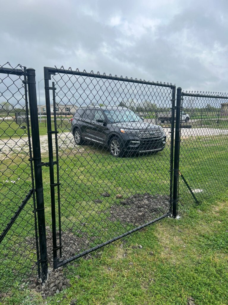 black chain link fence houston tx - Mustang Fencing and Gates "Black chain link fence installed in Houston, Texas by Mustang Fencing and Gates."