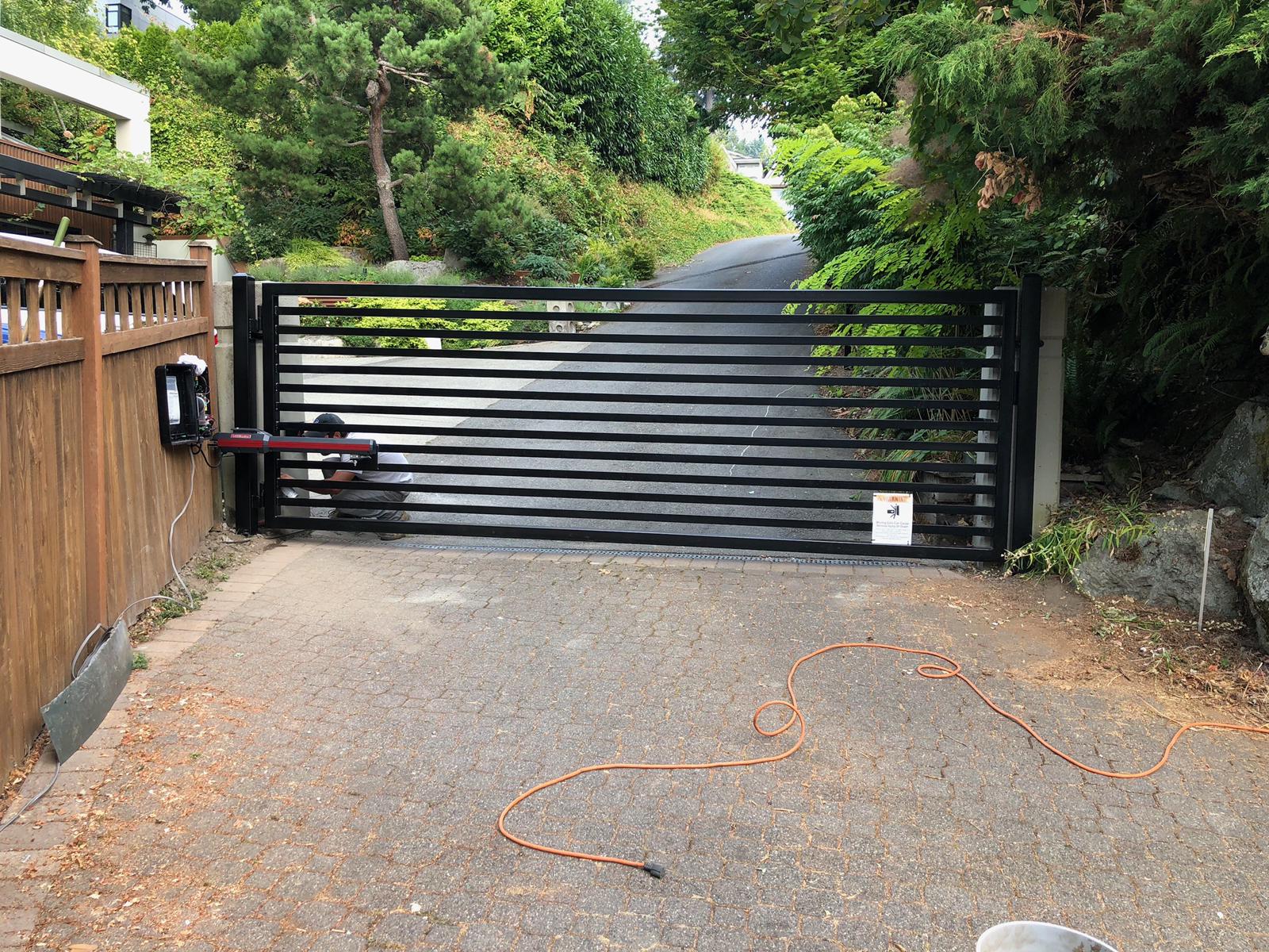 Automatic driveway gate installation upgrade at a Houston residence