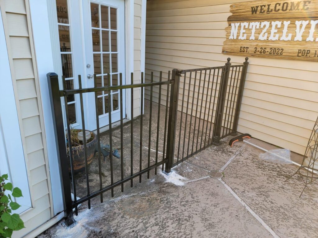 houston decorative metal gate patio entrance - Mustang Fencing and Gates "Decorative metal gate serving as an elegant patio entrance in Houston."