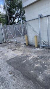 "Houston metal chain link gate and fence installed by Mustang Fencing and Gates."