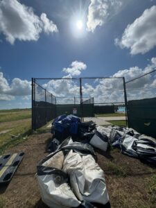 "Chain link fence in Houston, Texas on a sunny day, showcasing Mustang Fencing and Gates services."