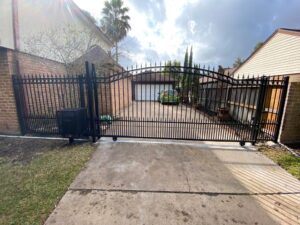 "Driveway gate in Houston, Texas, installed by Mustang Fencing and Gates."
