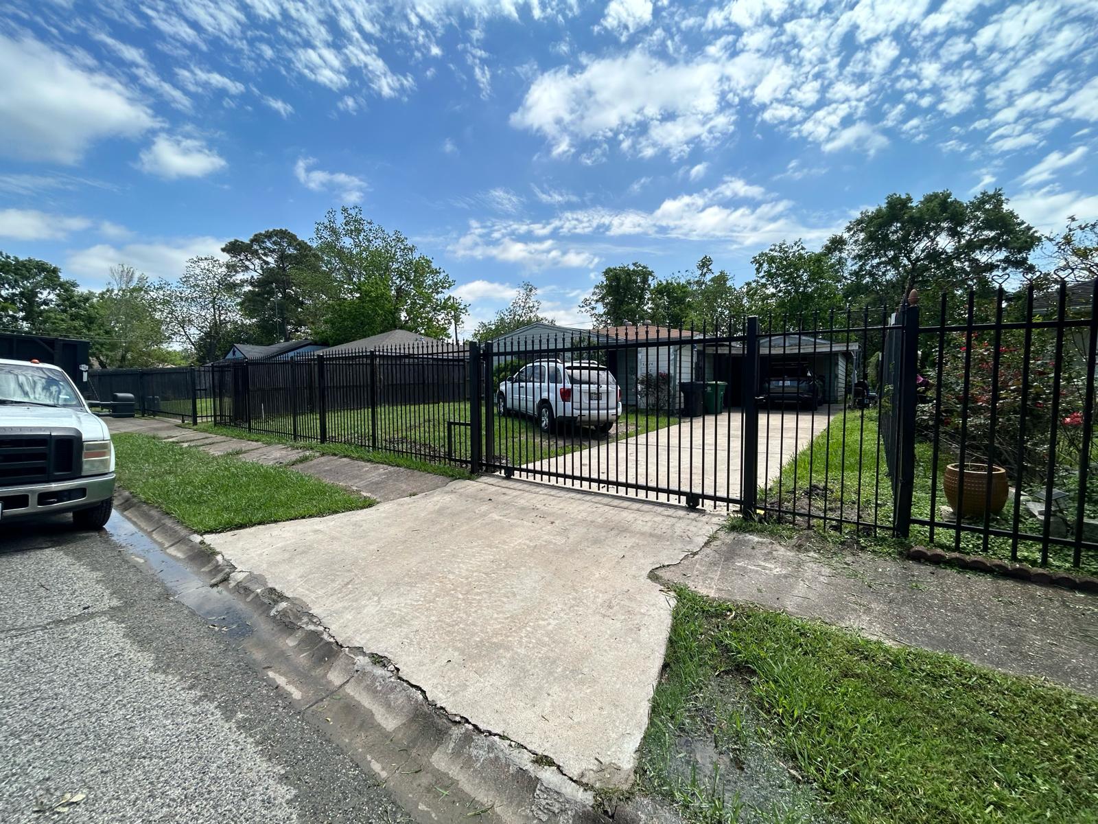Houston Texas metal fence gate driveway
