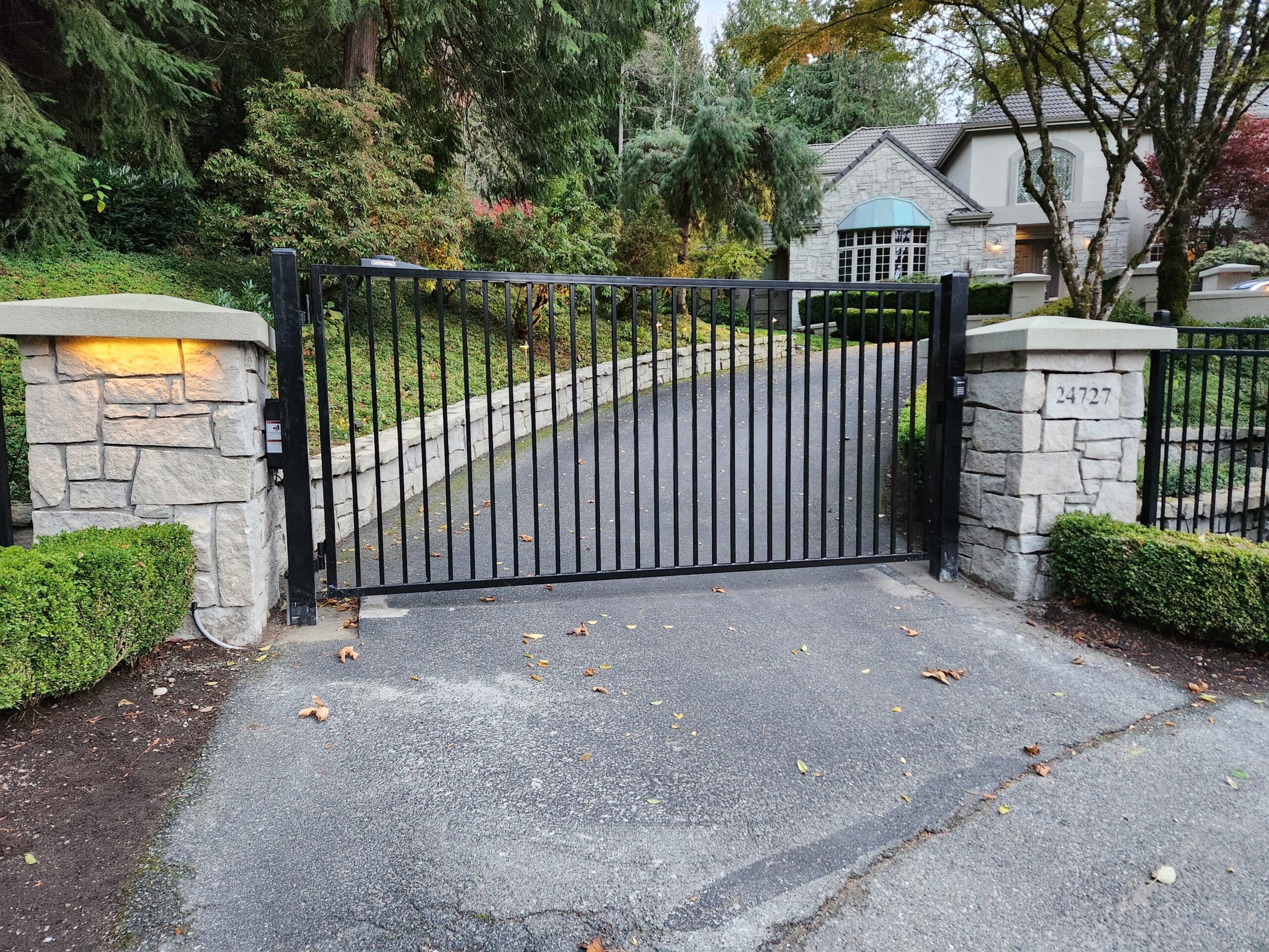 Modern automated driveway gate installed at a Houston, Texas home