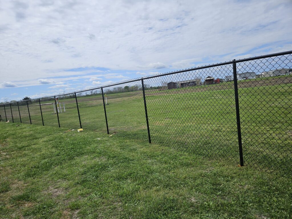 houston tx chain link fence field - Mustang Fencing and Gates "Chain link fence in a field in Houston, Texas, provided by Mustang Fencing and Gates."