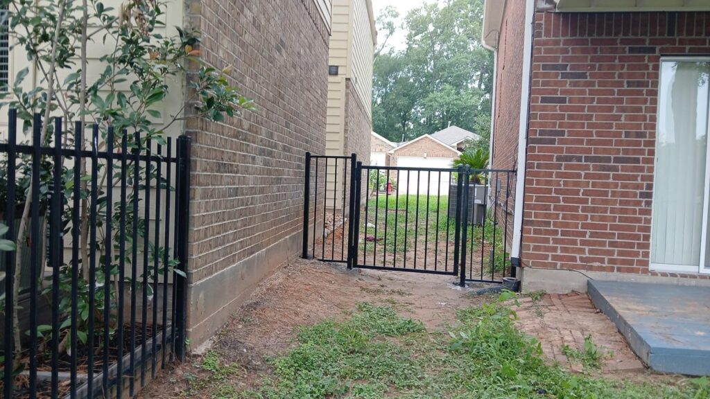 houston tx custom metal gate fence - Mustang Fencing and Gates "Custom metal gate and fence in Houston, TX, showcasing intricate design and high-quality craftsmanship by Mustang Fencing and Gates."