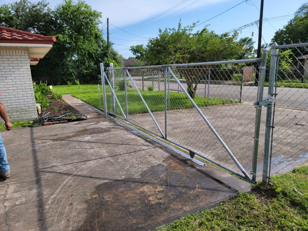 houston tx metal chain link gate - Mustang Fencing and Gates "Metal chain-link gate installed in Houston, TX by Mustang Fencing and Gates."