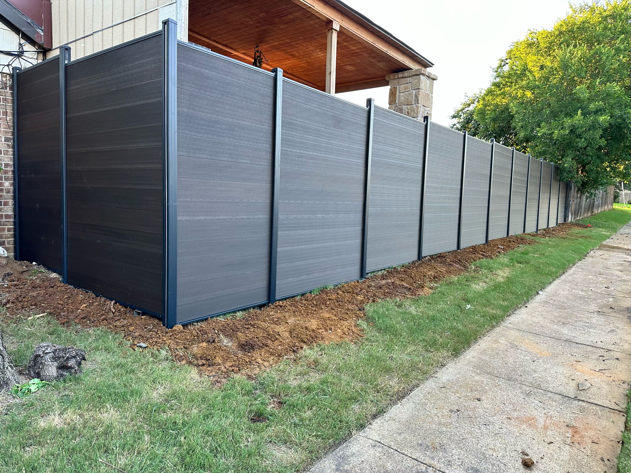 Modern privacy fence in Houston, TX by Mustang Fencing and Gates