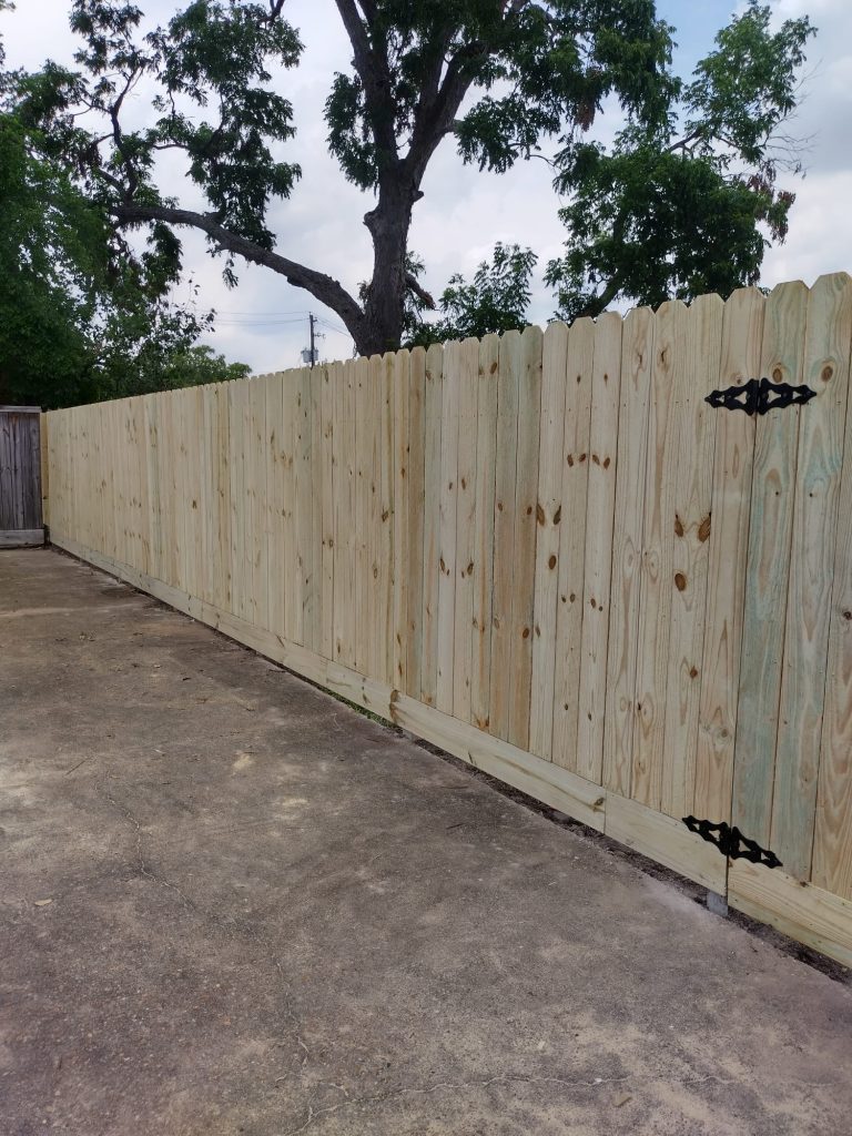 Building a Wooden Fence for His Houston Home