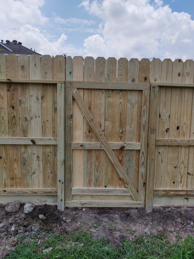 Building a Wooden Fence for His Houston Home